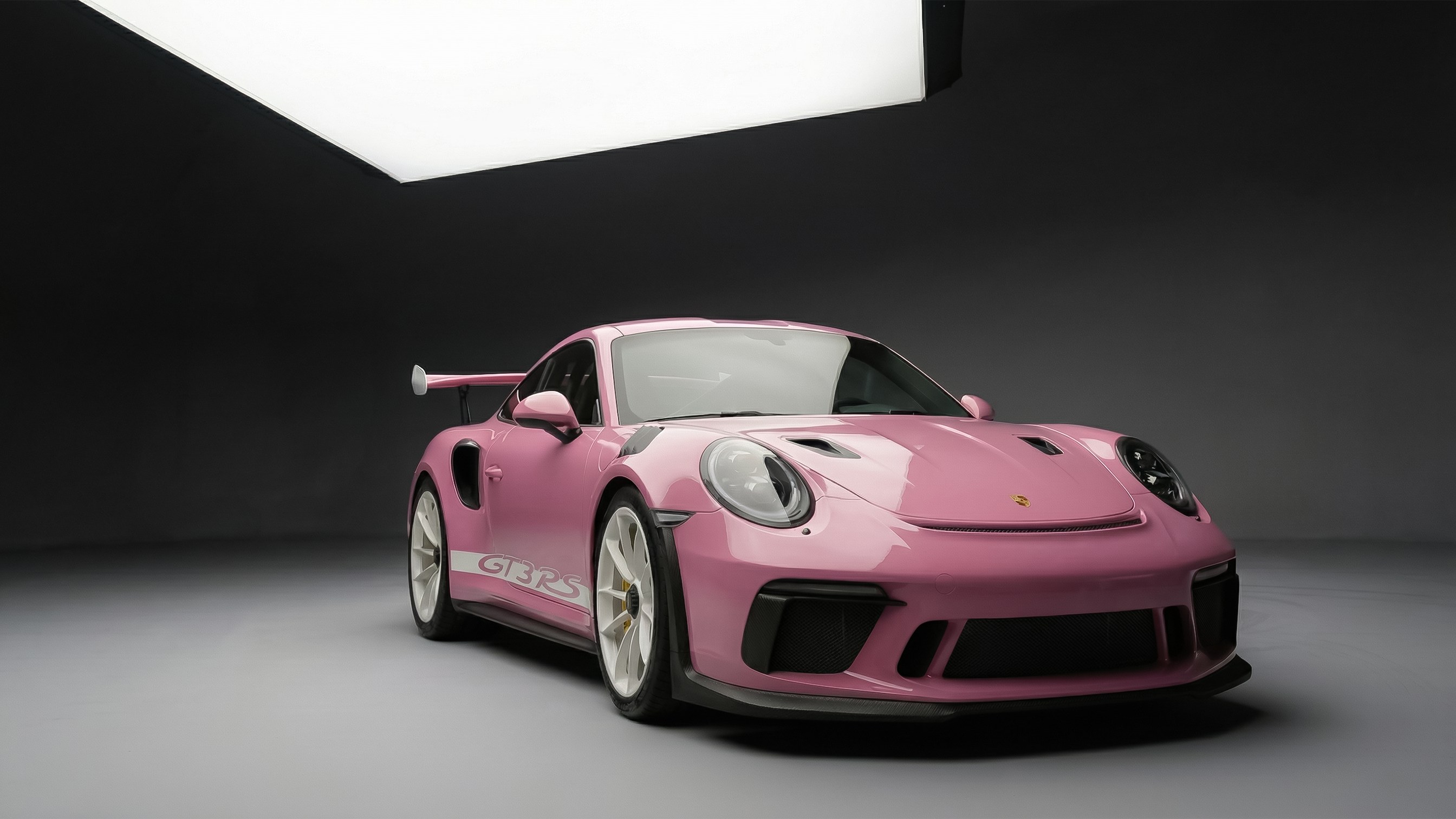 Pink sports car protected with Tinybot film